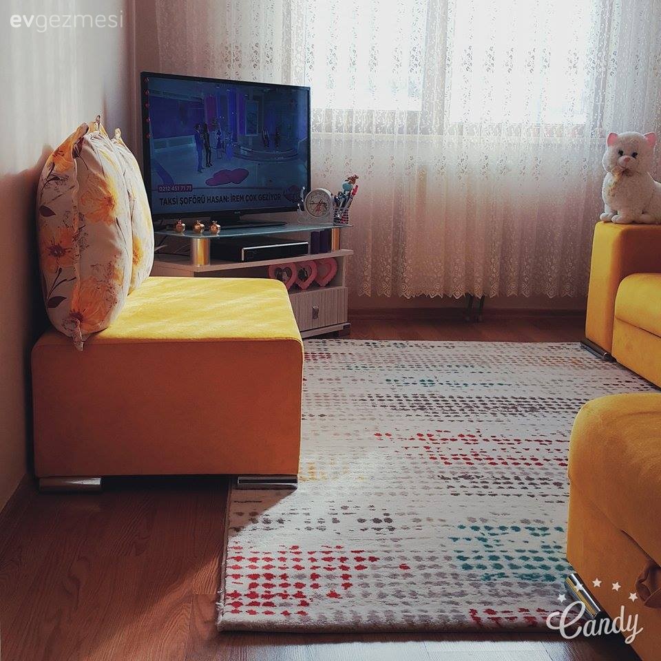 Gamze hanımın sarı vurgulu, dinamik oturma odası..