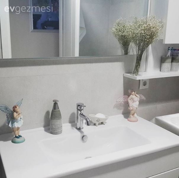 Burcu hanımın ahşabın sıcaklığı etkisindeki evinde sofistike bir dekor