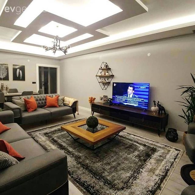 Salon, Modern rustik, Gri, Turuncu, Beyaz, Siyah, Gri koltuk, Kırlent, Ev tekstili, Halı, Salon halısı, Orta sehpa, Sehpa, Berjer, Ev bitkisi, Tablo, Duvar dekorasyonu, Sandalye, Yemek masası