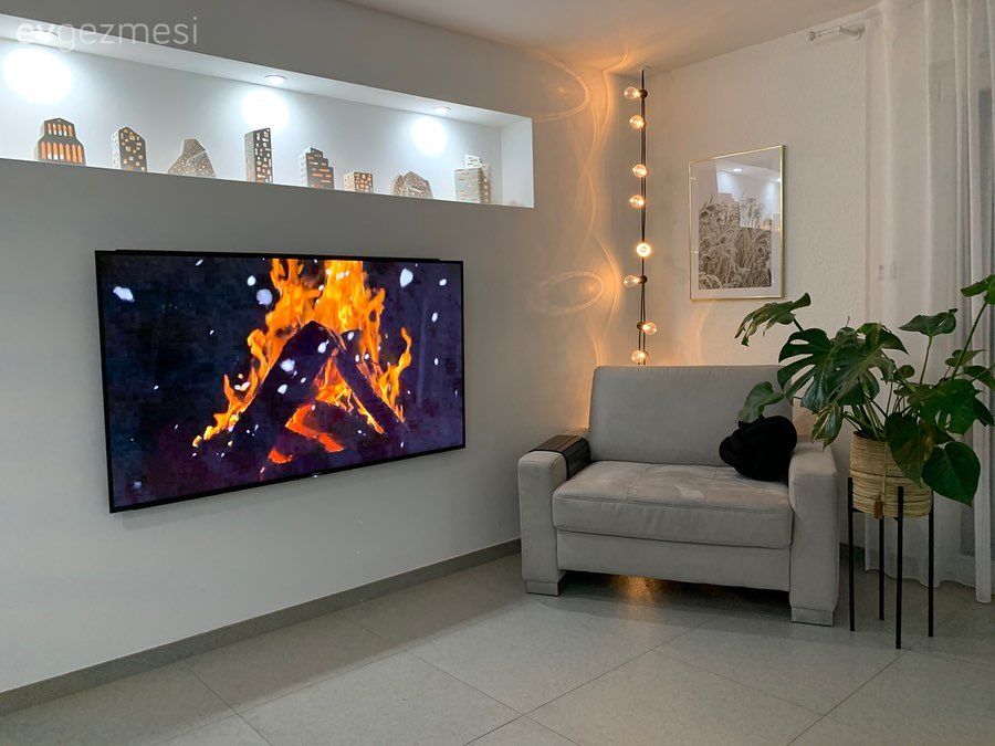 Oturma Odası, Bej, Beyaz, Siyah, Orta sehpa, Sehpa, Tablo, Duvar dekorasyonu, Spot aydınlatma, Aydınlatma, Halı, Saksı, Ev bitkisi, Sehpa üstü aksesuarı, Ev Aksesuar, Vazo, Çiçekler, Duvar Nişleri, Berjer, Mumluk, Lambader