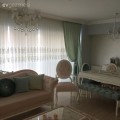Özge hanımın yumuşak pembe ve yeşil tonlarda, klasik stilde zarif evi.