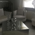 Gümüş ve beyaz uyumuyla göz alıcı bir alan: Nurgül hanımın salonu.