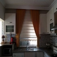 Doğal, country ve modern tarzların uyum içinde kullanıldığı harika ev