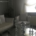 Gümüş ve beyaz uyumuyla göz alıcı bir alan: Nurgül hanımın salonu.