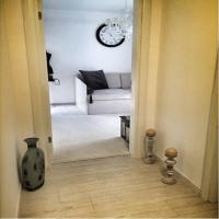 Doğal ton ve malzemelerle stil sahibi ve konforlu bir ev