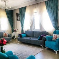 Özlem Hanım'ın mavi, gri ve morlarla renklenmiş enerjik evi