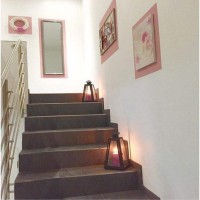 Fotolarına bakması bile içimizi ısıtan pembe ve gri ağırlıklı ev