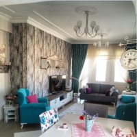 Özlem Hanım'ın mavi, gri ve morlarla renklenmiş enerjik evi