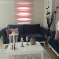 Ayşe hanımın pastellere lacivertle çarpıcı hava kattığı, uyumlu evi..